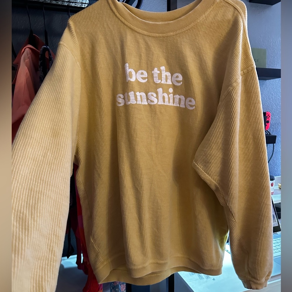 yellow sweatshirt